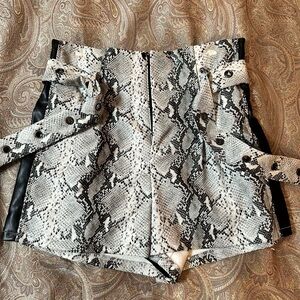 Leather shorts with tie belt